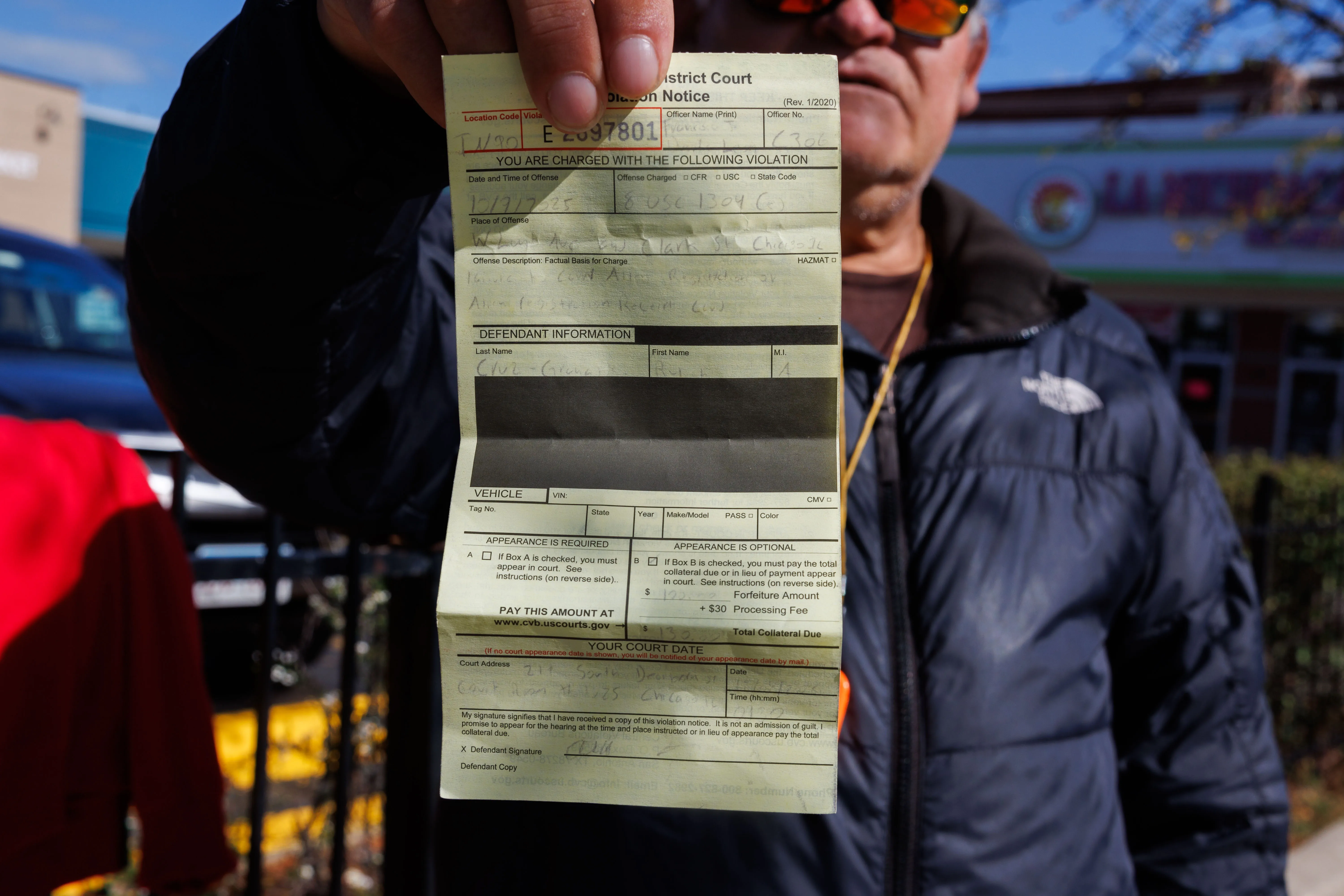 Legal permanent resident ticketed $130 for not carrying registration papers