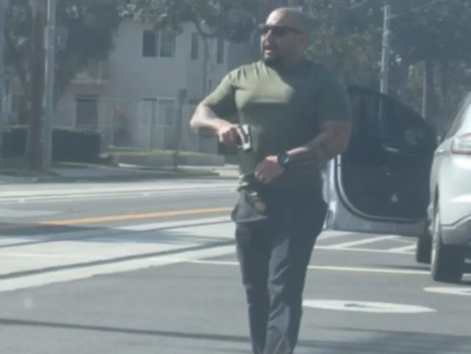ICE Agent Pulls Gun on Santa Ana Community Observer
