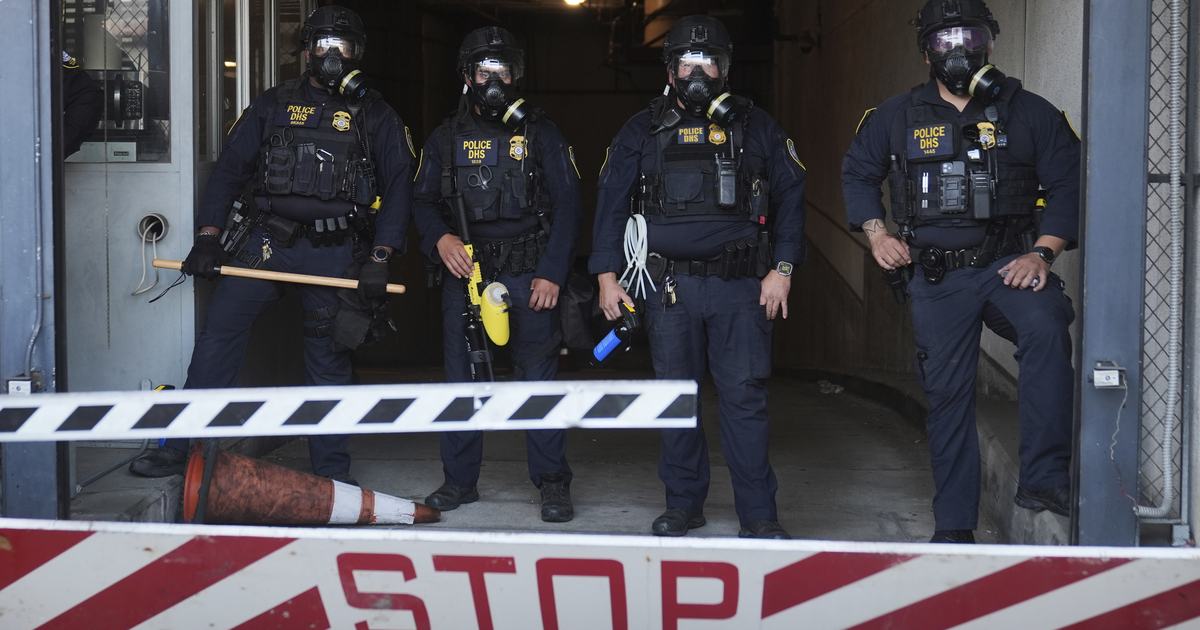 Journalist struck by flashbang shrapnel while filming spontaneous protest against immigration raid in LA Garment District
